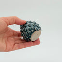 Kleybird Dotty bud vase with blue glaze and raised texture.