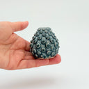 Kleybird Dotty bud vase with blue glaze and raised texture.