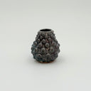 Kleybird Dotty bud vase with blue glaze and raised texture.
