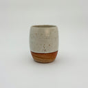 Kleybird Strata mug showing marbled clay bottom and white speckled glaze top.