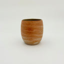 Kleybird Strata handleless tumbler with marbled clay exterior and light aqua interior 