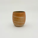 Kleybird Strata handleless tumbler with marbled clay exterior and light aqua interior 