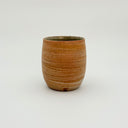 Kleybird Strata handleless tumbler with marbled clay exterior and light aqua interior