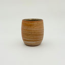Kleybird Strata handleless tumbler with marbled clay exterior and light aqua interior