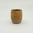 Kleybird Strata handleless tumbler with marbled clay exterior and light aqua interior